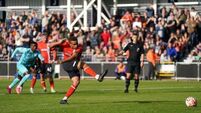 Luton off the mark after come-from-behind draw against 10-man Wolves