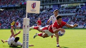 Wales comfortably top group as Louis Rees-Zammit claims hat-trick of tries Wales comfortably top group as Louis Rees-Zammit claims hat-trick of tries