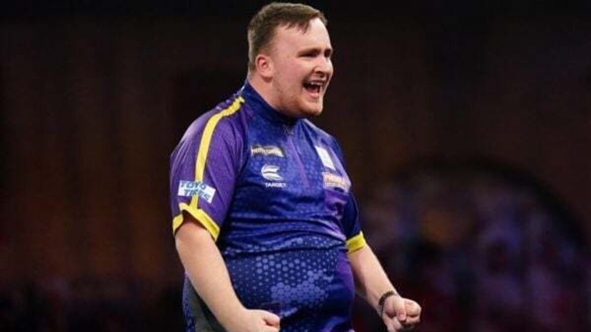 Luke Littler continues dream World Championship with victory over Andrew Gilding