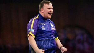 Luke Littler continues dream World Championship with victory over Andrew Gilding