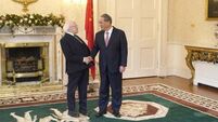 Top Chinese diplomat welcomed by President Higgins