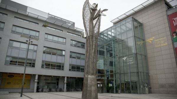 Student choked to death after eating food while lying in bed, inquest hears