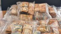 Woman (40s) arrested after seizure of €500,000 in cash