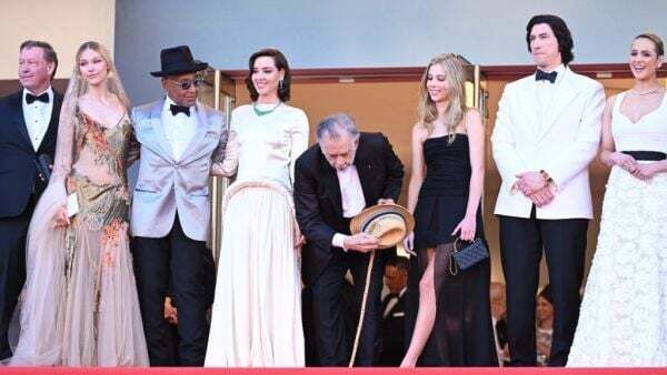 Francis Ford Coppola salutes the crowd at world premiere of Megalopolis