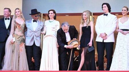 Francis Ford Coppola salutes the crowd at world premiere of Megalopolis