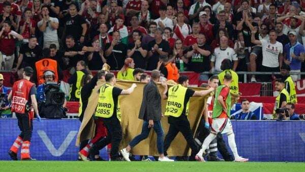 Hungary forward Barnabas Varga stable in hospital after going off on stretcher