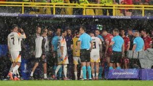 Germany-Denmark clash resumes after it was suspended due to torrential rain and thunder storm Germany-Denmark clash resumes after it was suspended due to torrential rain and thunder storm