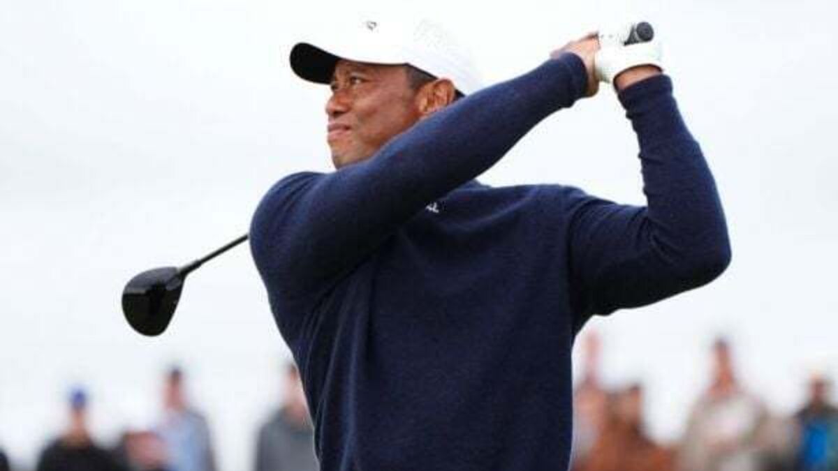 Struggling Tiger Woods set to miss Open cut as Shane Lowry moves into lead