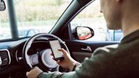 Total of 40% of young drivers admit to checking their phones while driving