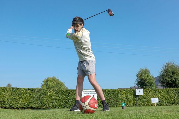 Kyle Burke seems to have gotten his games mixed up at the Portlaosie Panthers golf clasic Kyle Burke seems to have gotten his games mixed up at the Portlaosie Panthers golf clasic