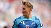 Arsenal’s Martin Odegaard limps out of Norway win with apparent ankle injury