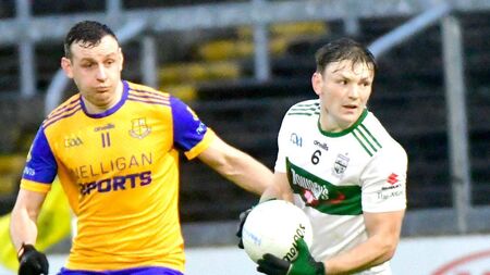 The Portlaoise goal rush swamps the Saints