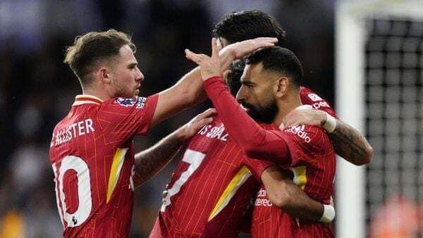 Liverpool go top of the Premier League after win at Wolves