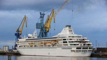 Passengers bid Belfast farewell as marooned luxury liner sets off