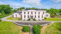 200-year-old Cork home with equestrian facilities and Gothic lodge comes to the market