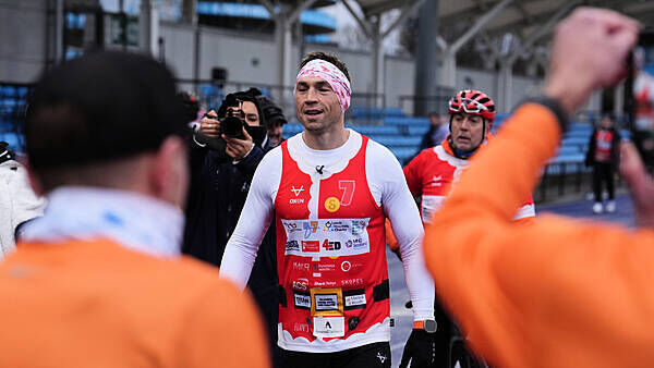 Kevin Sinfield defies injury to complete latest MND quest as donations pass £1m
