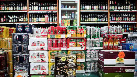 Pair armed with knives threaten staff at off-licence