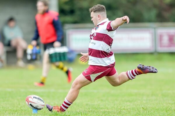 Darragh Jewell kicks a conversion for Portarlington in their opening Leinster League game against Garda Westmanstown Photo: Paul Dargan