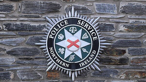 Police remove racially-motivated signs from outside primary school in Co Armagh