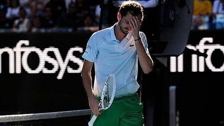Daniil Medvedev smashes net camera in anger during five-set Australian Open win