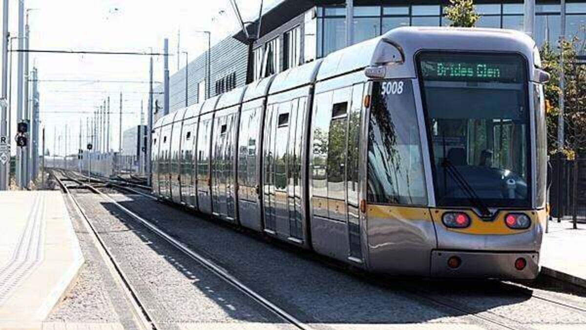 Two men jailed for involvement in a brawl on the luas where a man's ear was bitten
