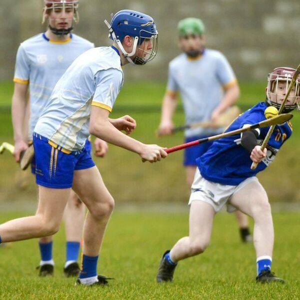 Jack Culleton (Mountmellick CS) running in possession as Maitiu Hopkins (Coláiste Íosagáin) challenges Photo: Denis Byrne Jack Culleton (Mountmellick CS) running in possession as Maitiu Hopkins (Coláiste Íosagáin) challenges Photo: Denis Byrne