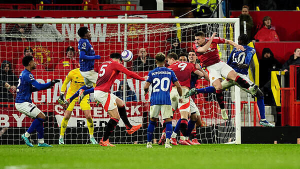 Manchester United battle with 10 men to secure much-needed win over Ipswich