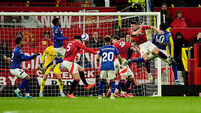 Manchester United battle with 10 men to secure much-needed win over Ipswich