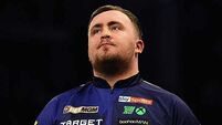 Luke Littler claims UK Open title after thrashing James Wade in one-sided final