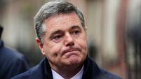 Income tax cuts at risk due to trade war, Donohoe says