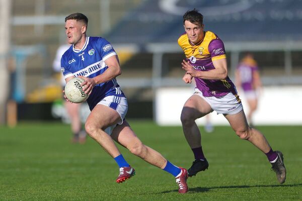 Patrick O'Sullivan, who came up from defence to score one of Laois's goals, seen here drive forward Photo: Paul Dargan Patrick O'Sullivan, who came up from defence to score one of Laois's goals, seen here drive forward Photo: Paul Dargan