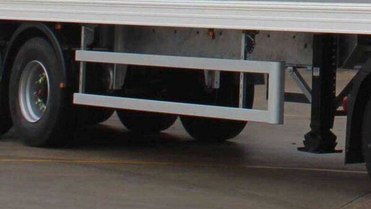 Child unharmed after going under moving truck