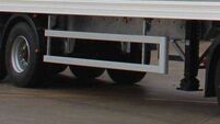 Child unharmed after going under moving truck