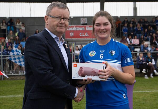 Laois's Clodagh Tynan is presented with the player of the match award following the Very Camogie National League final Photo: ©INPHO/Leah Scholes