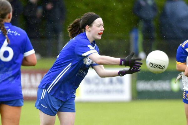 Caoimhe Fitzpatrick gets her p[ass away for Laois against Longford Photo: Denis Byrne Caoimhe Fitzpatrick gets her p[ass away for Laois against Longford Photo: Denis Byrne