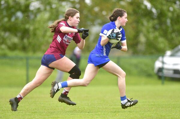 Laois's Kara Powders breaks with Westmeath's Erin O'Faolain giving chase  Photo: Denis Byrne