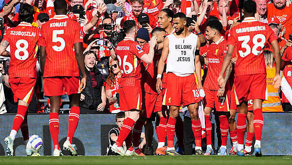 Liverpool secure Premier League title with crushing win against Tottenham