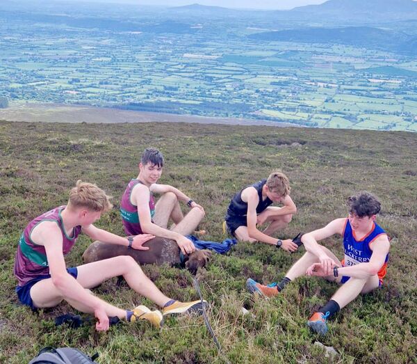 St Michael's AC runners Riley Connolly, Tadhg O'Comhairde, Sean McAuliffe and West Muskerry's Finn Yore relaxing after their race St Michael's AC runners Riley Connolly, Tadhg O'Comhairde, Sean McAuliffe and West Muskerry's Finn Yore relaxing after their race