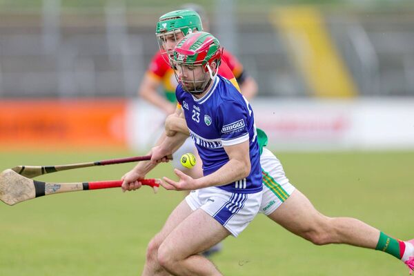 Laois's Jer Quinlan gathers this ball ahead of his marker Photo: Paul Dargan Laois's Jer Quinlan gathers this ball ahead of his marker Photo: Paul Dargan