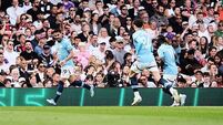 Manchester City clinch Champions League spot with victory at Fulham