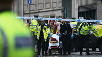 Man detained after car collides with pedestrians during Premier League parade