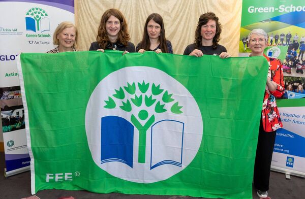 Mountmellick FEC students Esther Byrne and Rowan McKenna and teachers Ms Mary Troy and Ms Adela Meally with Karen Moore, Community Climate Action Officer with Laois County Council at the Green Schools awards in Kilkenny. Picture: Alf Harvey.