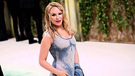 Kylie Minogue postpones run of tour shows after ‘succumbing to viral infection’