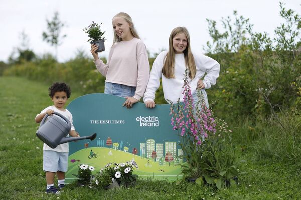 Pictured at the launch of The Irish Times Ireland's Greenest Places 2025 in association with Electric Ireland are Beth Healy (12), Laura Gargiuto Keenan (12) and Jaxon Okon (2). Photo: Julien Behal Photography
