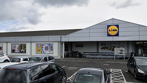 Man who drove with Lidl manager on car bonnet after checkout row avoids jail