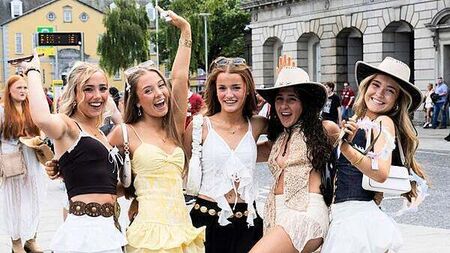 In photos: Crowds enjoy sunshine on year's hottest day ahead of busy weekend of events