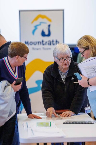 Members of the public discussing plans at the public Information evening on proposed enhancement works to Patrick Street and the River Walk in Mountrath held by Laois County Council at Bloom HQ. Picture: Jeff Harvey