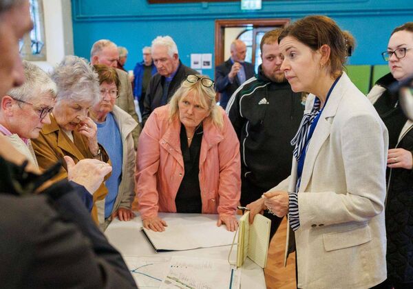 Members of the public discussing plans at the public Information evening on proposed enhancement works to Patrick Street and the River Walk in Mountrath held by Laois County Council at Bloom HQ. Picture: Jeff Harvey