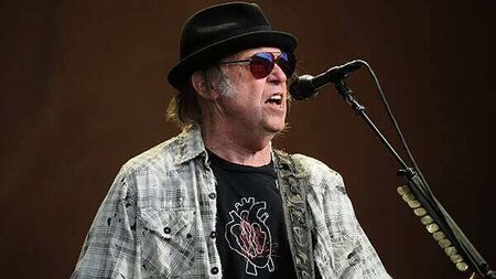 Neil Young’s Glastonbury headline set to be broadcast live on BBC after U-turn