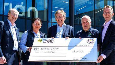 Agri-food business presents cheque to Laois based charity Embrace FARM